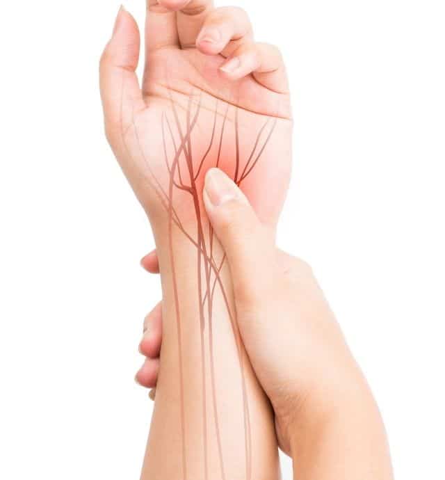 a close-up of a person holding wrist with an illustration of passing nerve cells.
