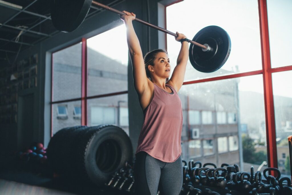 A woman weight lifting can cause damage and cause degenerative disc disease
